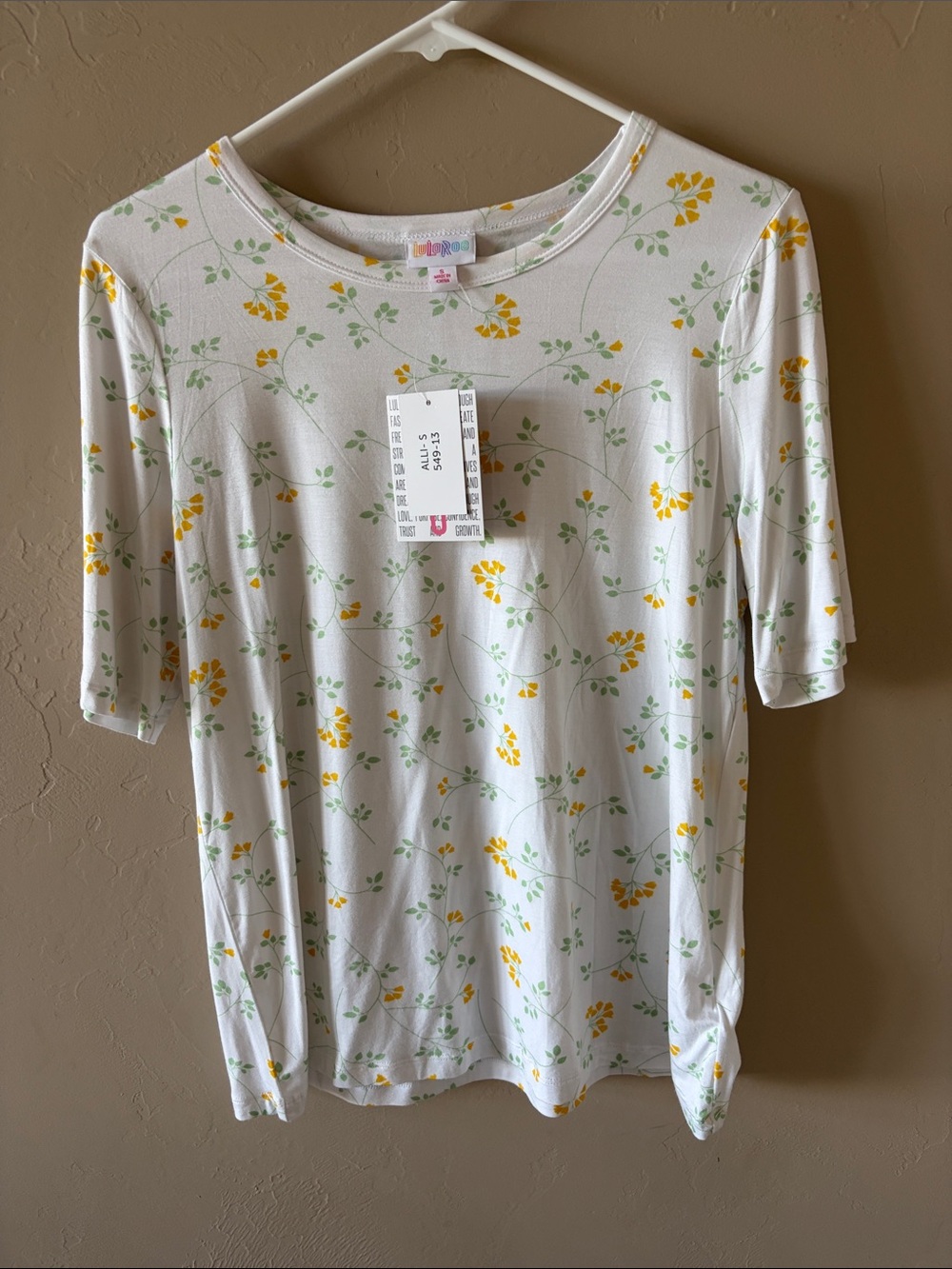 LuLaRoe White Top with Yellow Floral Print